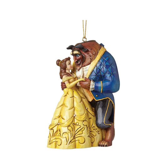 Disney Traditions combines the magic of Disney with the festive artistry of Jim Shore's Heartwood Creek. This Beauty &amp; The Beast cast stone hanging ornament is sure to add Disney's magic and romance to your Christmas tree.&nbsp;