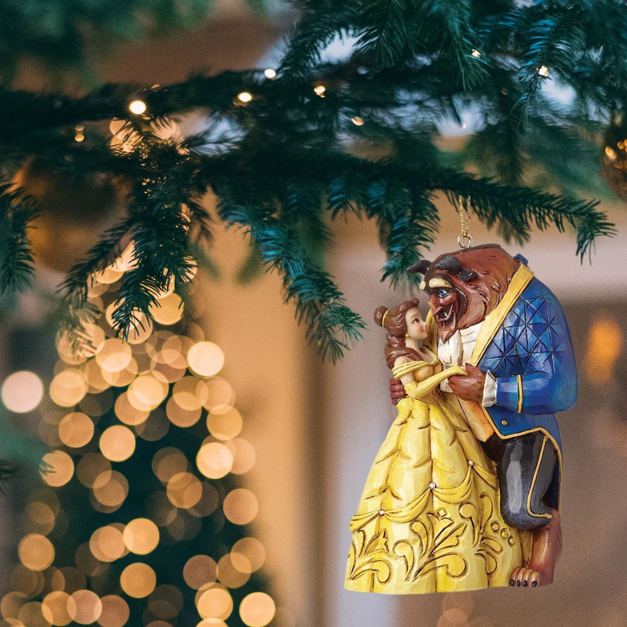 Disney Beauty and The Beast Hanging Ornament  This Beauty & The Beast cast stone hanging ornament is sure to add Disney's magic and romance to your Christmas tree. Bestseller.