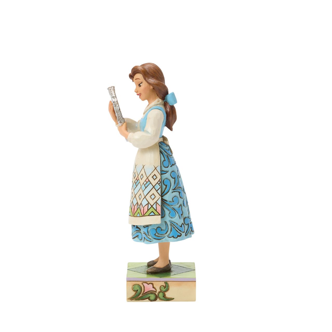 Belle gazes into the enchanted mirror in this graceful Jim Shore scene, catching a glimpse of the Beast from afar. Surrounded by rich detail and folk art flourishes, the design reflects Belle's empathy and love of discovery in true Disney style.