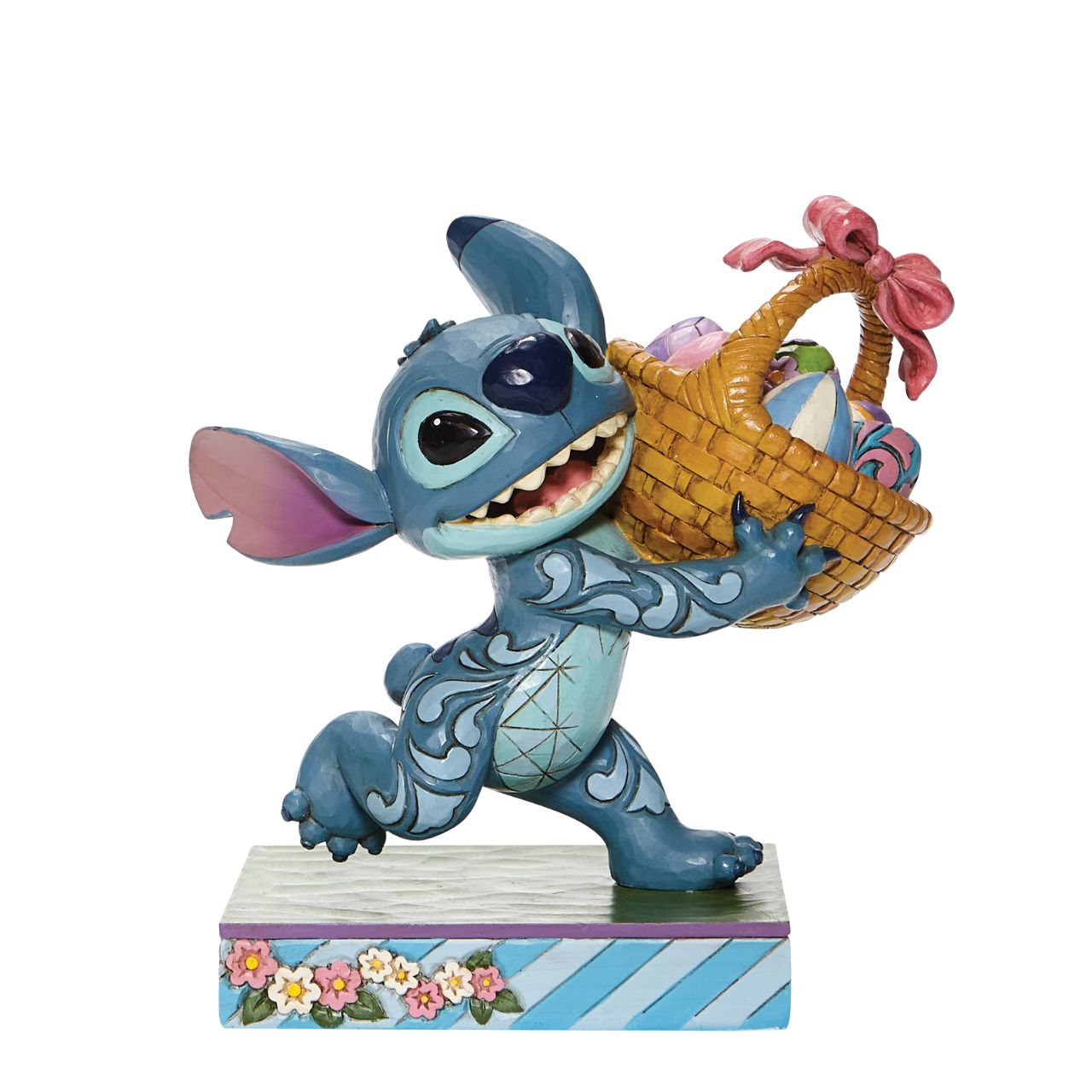 Jim Shore Bizarre Bunny - Stitch Running off with Easter Basket Figurine  Mischievous Stitch has taken off with your Easter basket so try and catch him if you can or entice him with his favourite, "Coconut Cake"| Designed by Jim Shore, this fun-loving Disney Traditions piece is hand-painted in cheery springtime hues.