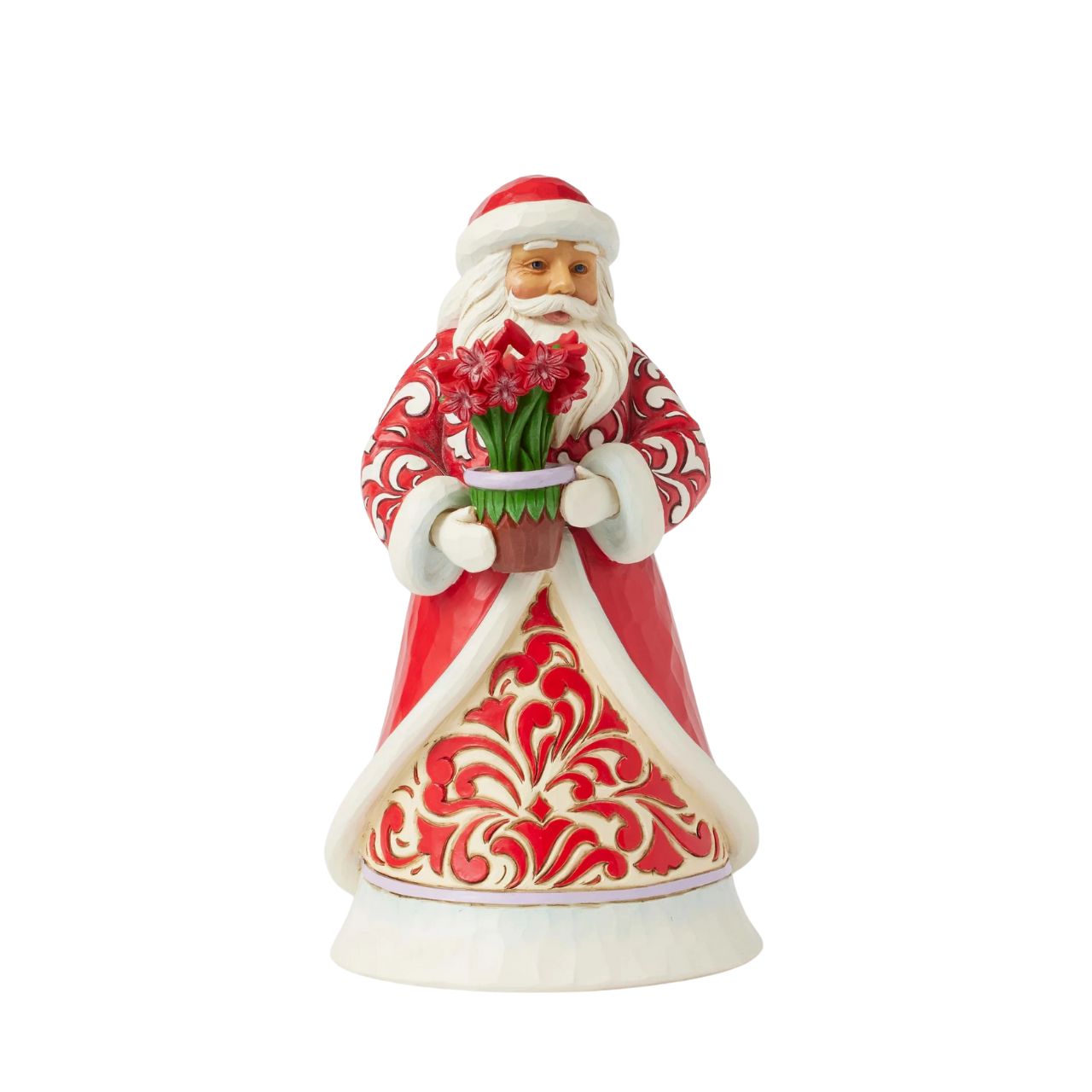 With a peaceful smile, this Jim Shore Santa holds a vase of vibrant amaryllis flowers, symbolizing the beauty and resilience of winter. His intricately patterned rosemaling coat adds a timeless touch of serenity to your holiday home décor.