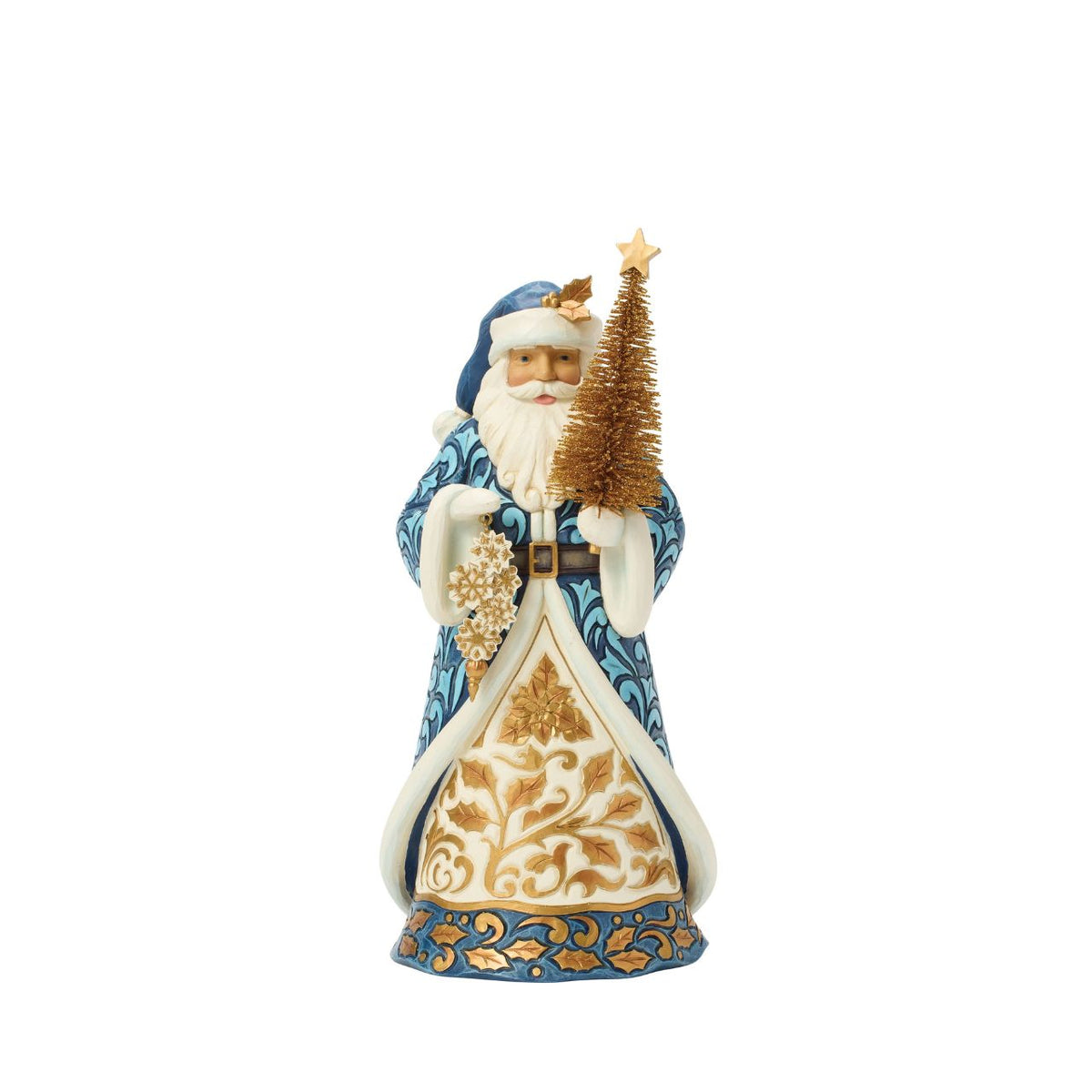 Dressed in twilight blues and striking golds, this regal Santa carries a sisal tree and snowflakes. Jim Shore's cool tones and intricate designs inspire elegant winter magic. Add a refined touch to your seasonal home decor.
