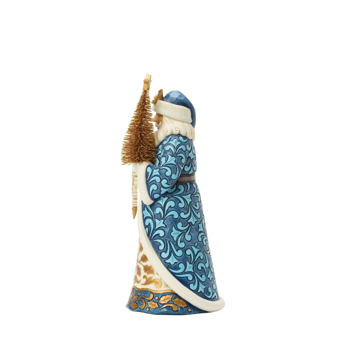 Dressed in twilight blues and striking golds, this regal Santa carries a sisal tree and snowflakes. Jim Shore's cool tones and intricate designs inspire elegant winter magic. Add a refined touch to your seasonal home decor.