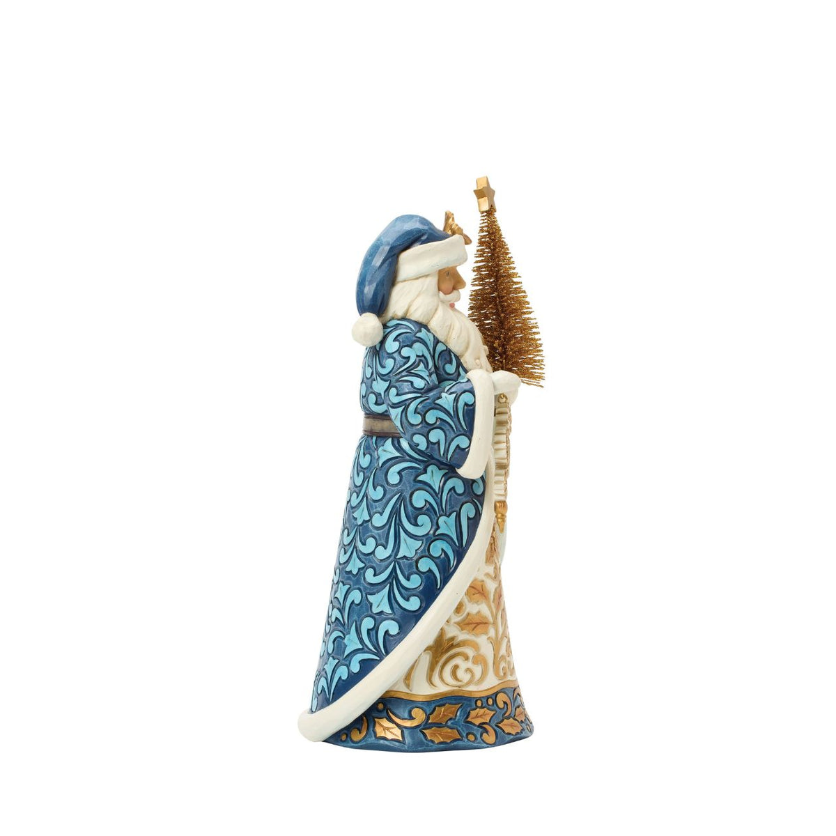 Dressed in twilight blues and striking golds, this regal Santa carries a sisal tree and snowflakes. Jim Shore's cool tones and intricate designs inspire elegant winter magic. Add a refined touch to your seasonal home decor.