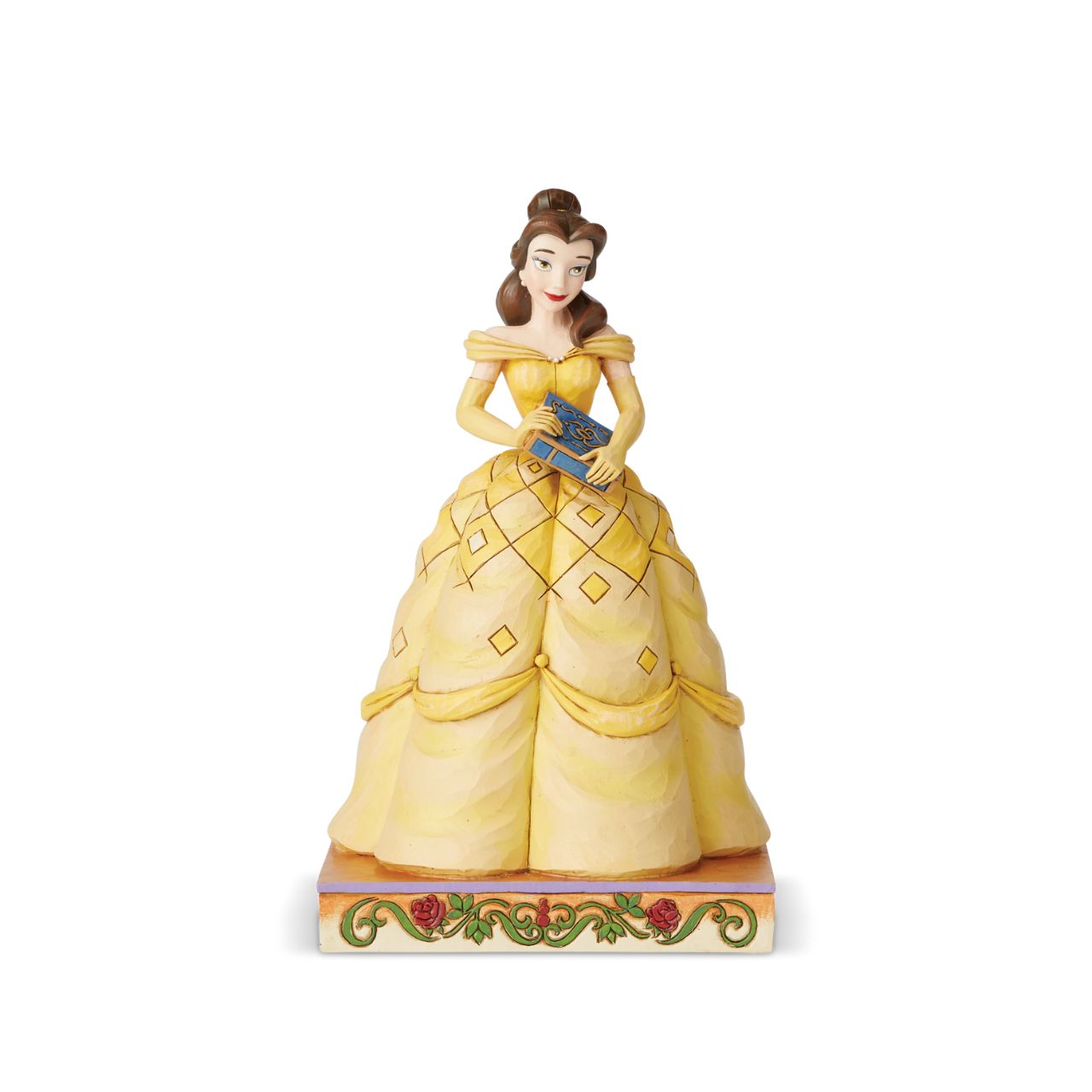 Disney Traditions Book-Smart Beauty Belle Princess Passion  Belle always has her nose in a book, filling her imagination with adventure. The book-smart beauty begins her own timeless tale when she meets the Beast. In this lovely Jim Shore design, Belle wears her classic yellow gown and holds a book in her hands.