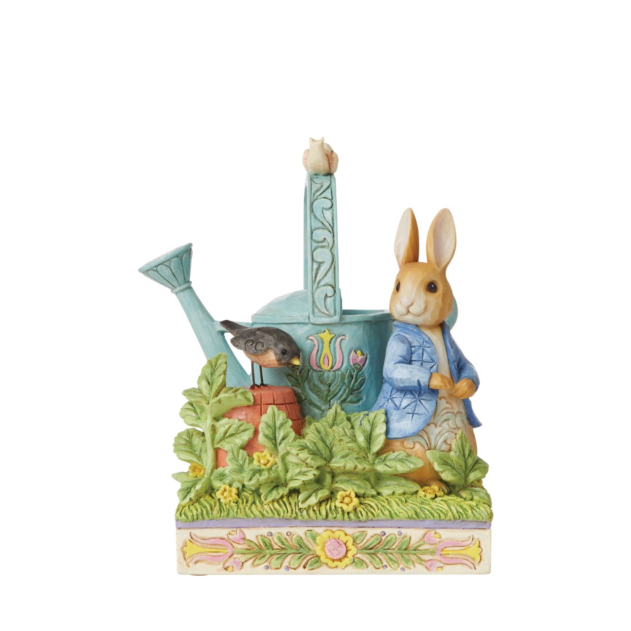 Award winning folk artist Jim Shore brings his unique style to Beatrix Potter's beloved story, The Tale of Peter Rabbit, through charming hand-crafted gifts that will delight her readers of all ages. This Jim Shore figurine features the adventurous Rabbit after he's squeezed under the garden gate to gorge on Mr. McGregor's garden vegetables again.