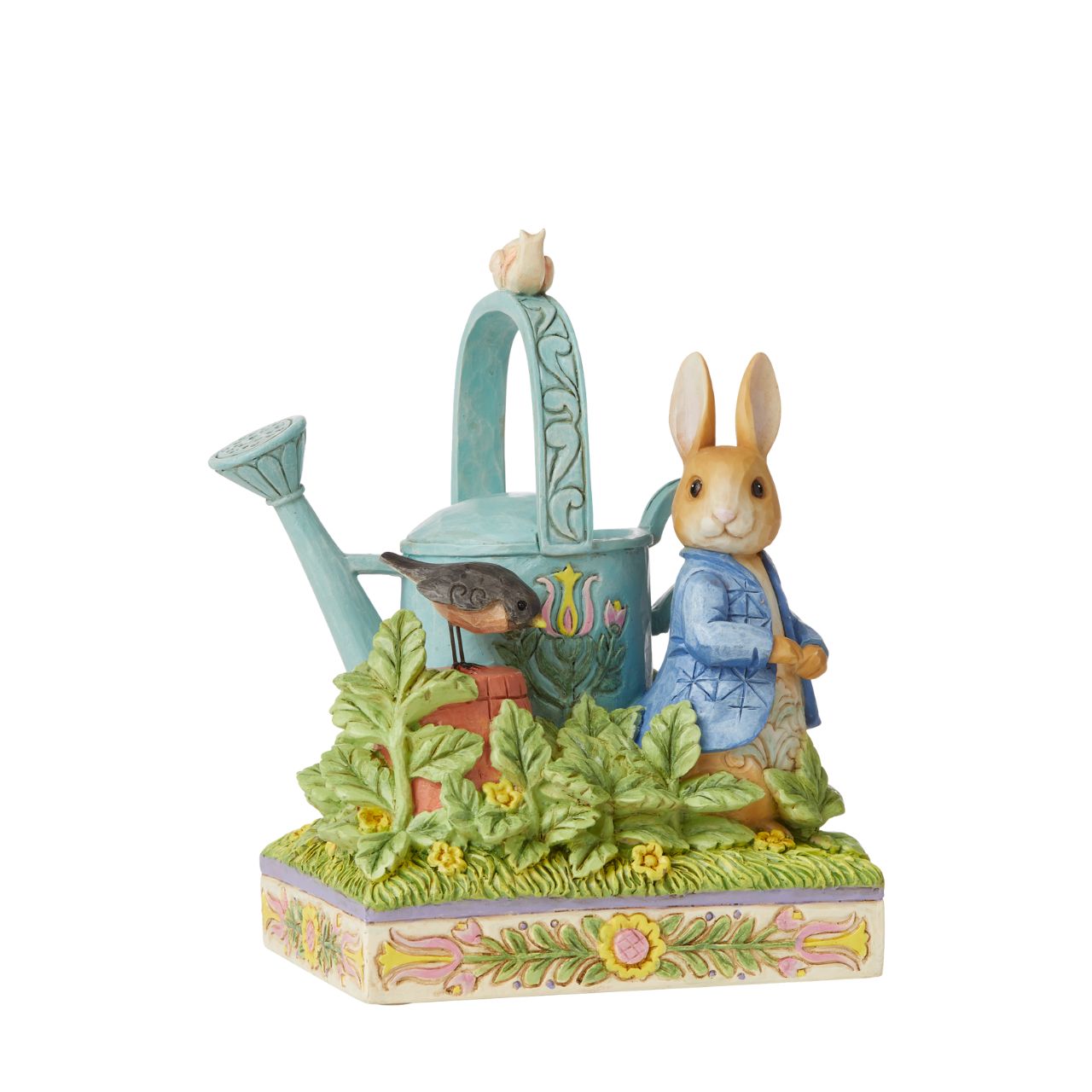 Award winning folk artist Jim Shore brings his unique style to Beatrix Potter's beloved story, The Tale of Peter Rabbit, through charming hand-crafted gifts that will delight her readers of all ages. This Jim Shore figurine features the adventurous Rabbit after he's squeezed under the garden gate to gorge on Mr. McGregor's garden vegetables again.