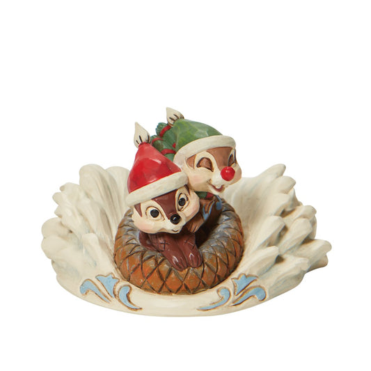 Chip & Dale Sledding Figurine by Jim Shore  "Fun in the Snow" These two brothers never leave each other's side and stick together like glue in this Jim Shore creation. Coasting down a snow covered mountain, the pair cling together in an acorn sled. 