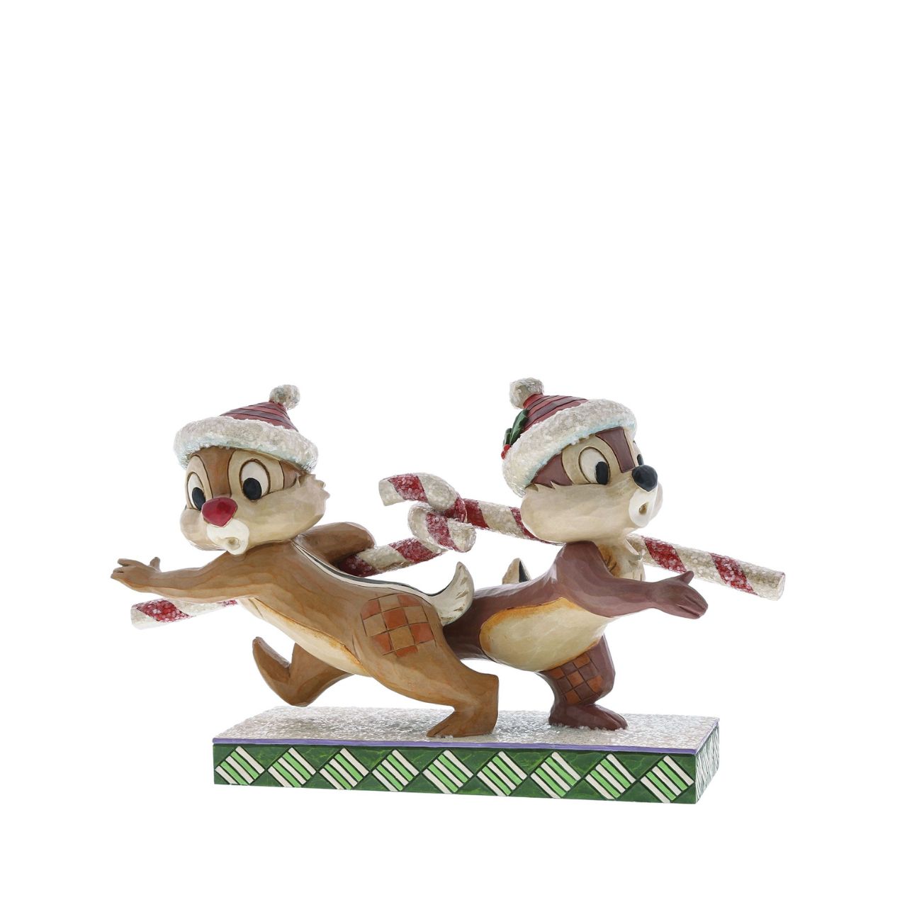 "Candy Cane Caper" Chip and Dale work at charming cross purposes in this beguiling design from the artistry of Jim Shore. Beautifully decorated with sparkling sugary accents, this comical Christmas piece blends Jim's distinctive style with the enduring humour of Disney.