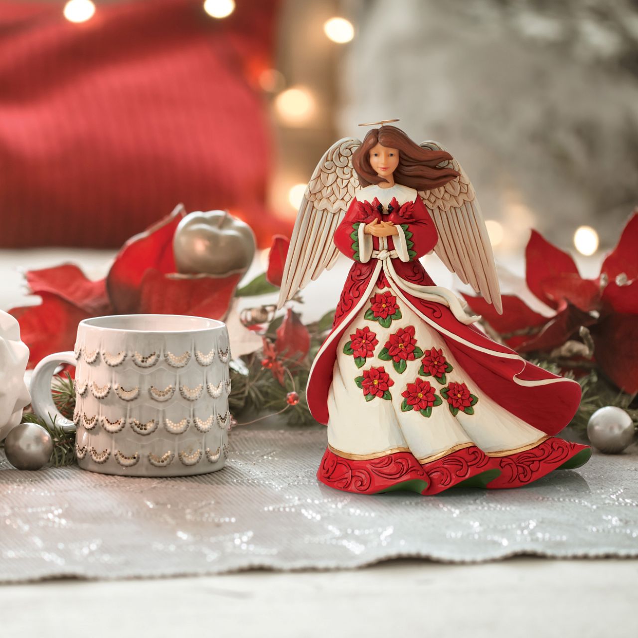 Heartwood Creek Christmas Angel Figurine  Celebrate Christmas this year with this beautiful Heartwood Creek collection figurine by Jim Shore. This beautiful hand crafted and hand painted Christmas Angel figurine would look beautiful in any home.