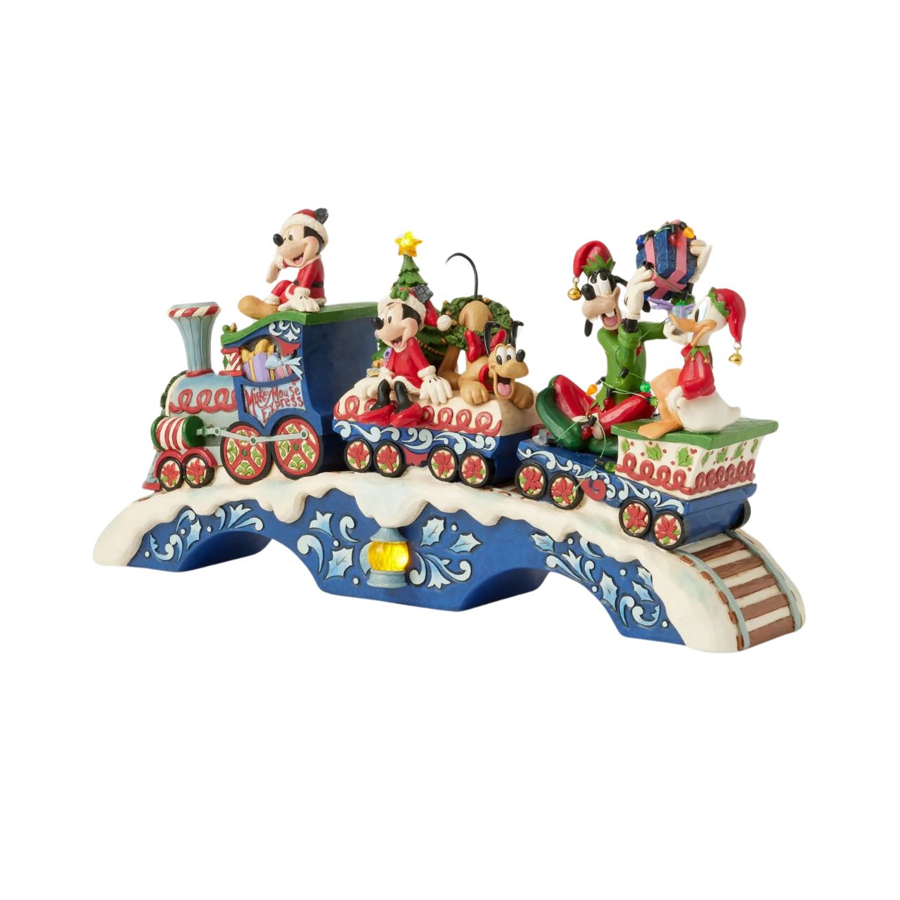 This fantastic Jim Shore Mickey Mouse Express chugs along a snowy track, bringing festive cheer as it lights up and plays eight beloved Christmas tunes. With intricate details, the train showcases Mickey and his friends, trees, gifts, and lights.