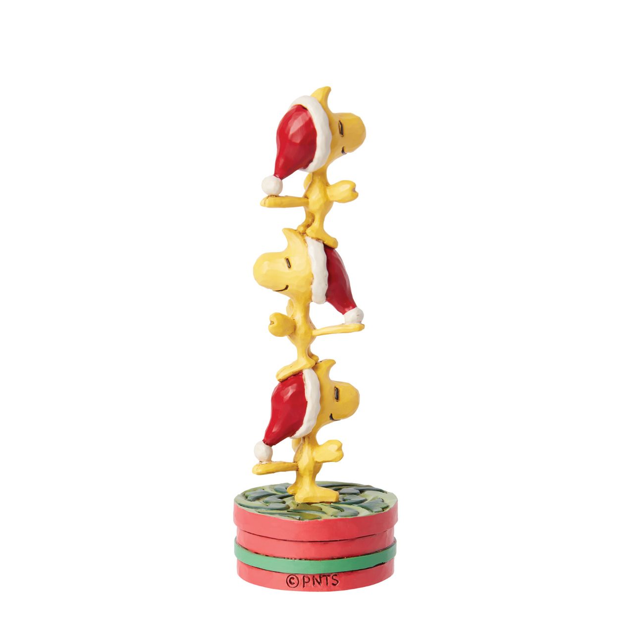 Celebrate Woodstock's 60th anniversary with this adorable creation from Jim Shore. Woodstock and his brothers don Santa hats and form a tower standing on one another's heads. With rosemale details, the trio delights with stacked holiday spirit.