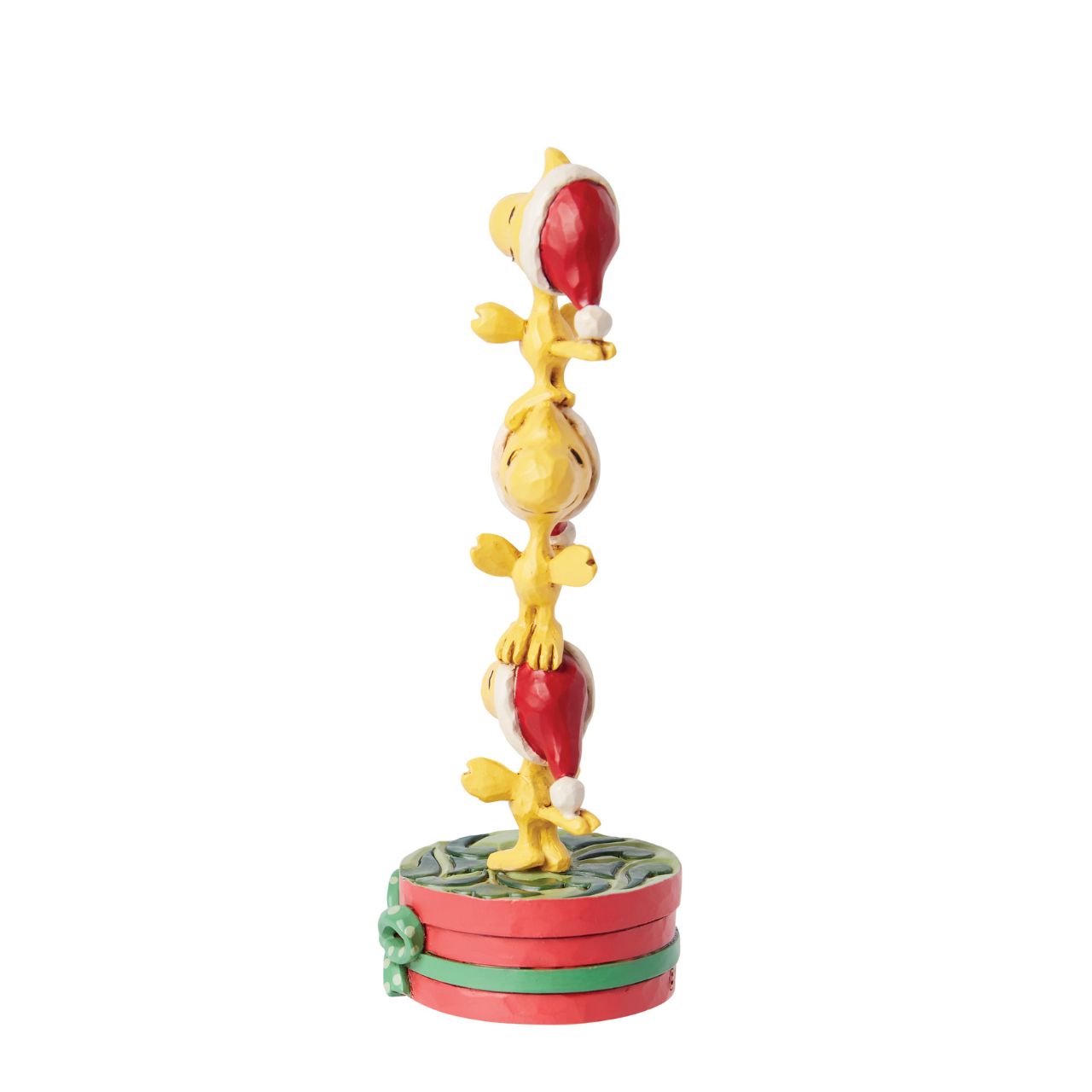 Celebrate Woodstock's 60th anniversary with this adorable creation from Jim Shore. Woodstock and his brothers don Santa hats and form a tower standing on one another's heads. With rosemale details, the trio delights with stacked holiday spirit.