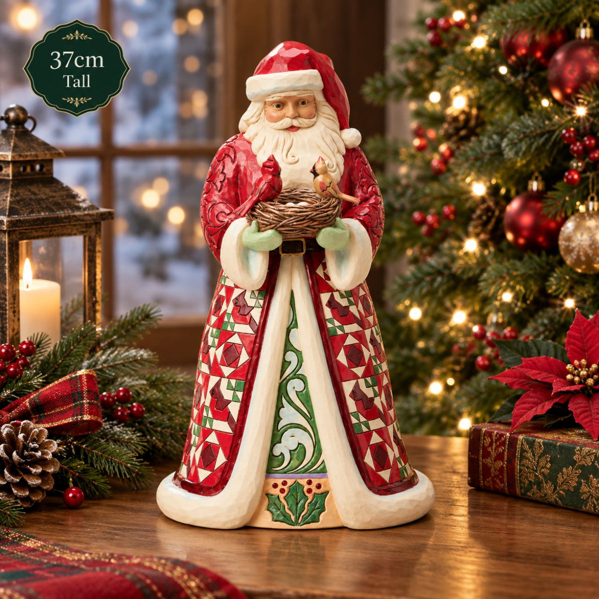 Celebrate the warmth of the season with this distinguished Collector's Edition Santa from Jim Shore's Heartwood Creek collection. Standing proudly with a nest of cardinals nestled in his arms, this beautifully crafted design reveals a charming surprise inside – delicate cardinal eggs waiting to be discovered.