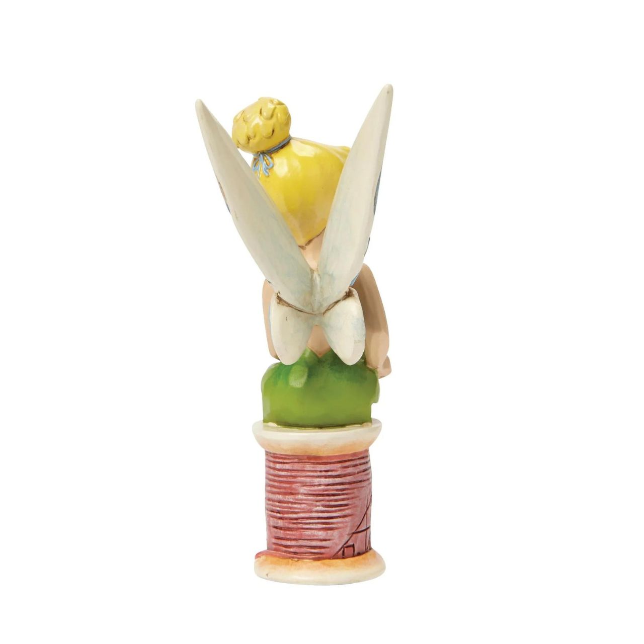 Disney Tinker Bell Crafty Tink Figurine  Tinker Bell takes a rest on a tiny spool of thread. Great for Tink lovers, Jim Shore collectors and sewing enthusiasts alike. A fun and flirty new personality pose from award winning artist and sculptor, Jim Shore.