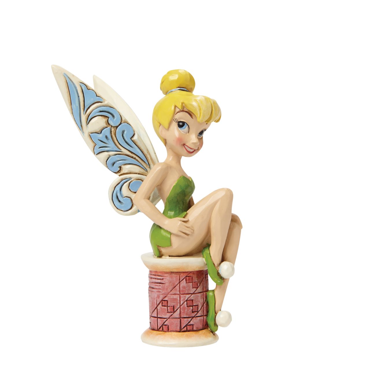 Disney Tinker Bell Crafty Tink Figurine  Tinker Bell takes a rest on a tiny spool of thread. Great for Tink lovers, Jim Shore collectors and sewing enthusiasts alike. A fun and flirty new personality pose from award winning artist and sculptor, Jim Shore.