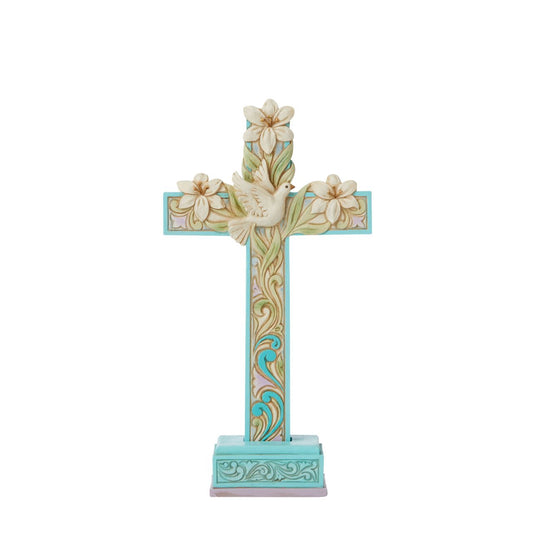 Cross with Lilies and Dove Figurine by Jim Shore  Brandished in Easter lilies, this cool blue and purple Jim Shore cross hosts intertwining vines of promise and serenity. A beautiful white dove sits in the centre of the crucifix, symbolizing the peace and promise of new life delivered by Jesus' resurrection.