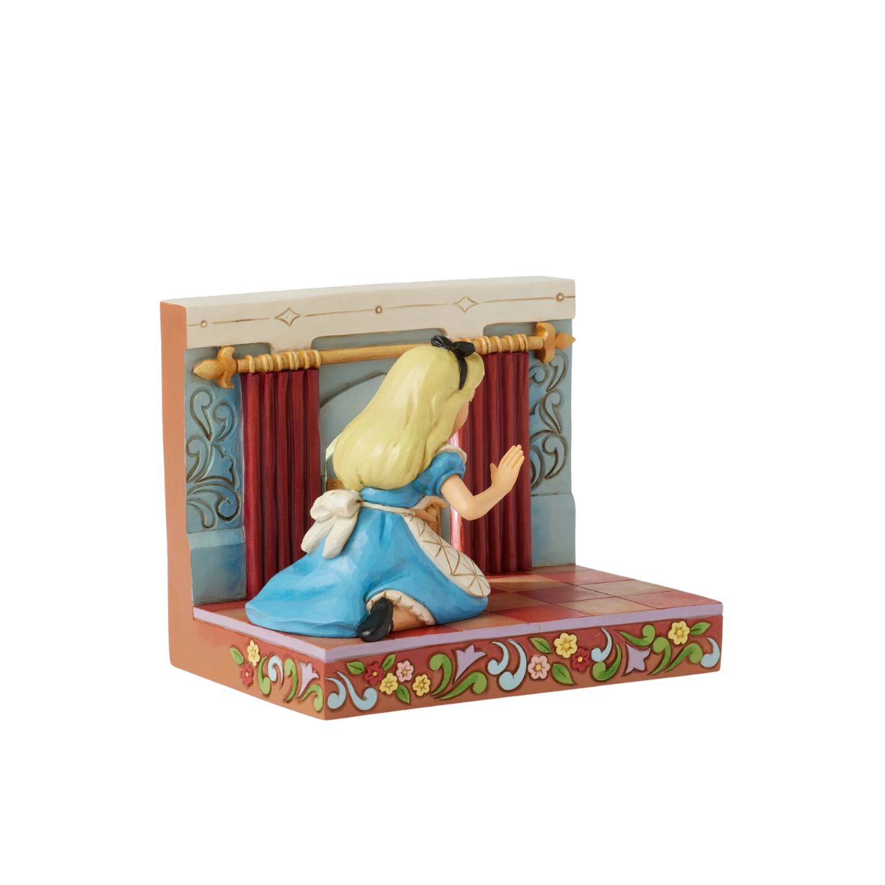 Alice eagerly opens the door to Wonderland, twisting the smiling doorknob while the curtains draw back to reveal the enchanting realm beyond. With inviting LED lights, this captivating Jim Shore scene captures the curiosity of Alice's adventure.