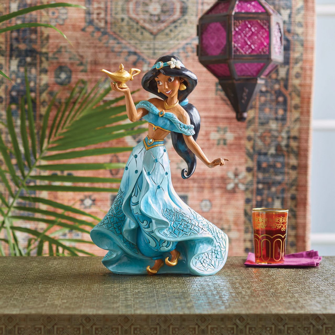A deluxe masterpiece of the Princess Jasmine from Disney's Aladdin. Hand painted and hand carved, decorated with jewels and filled with intricate details. Perfect for any Disney Traditions collector. Comes in a fully branded gift box.