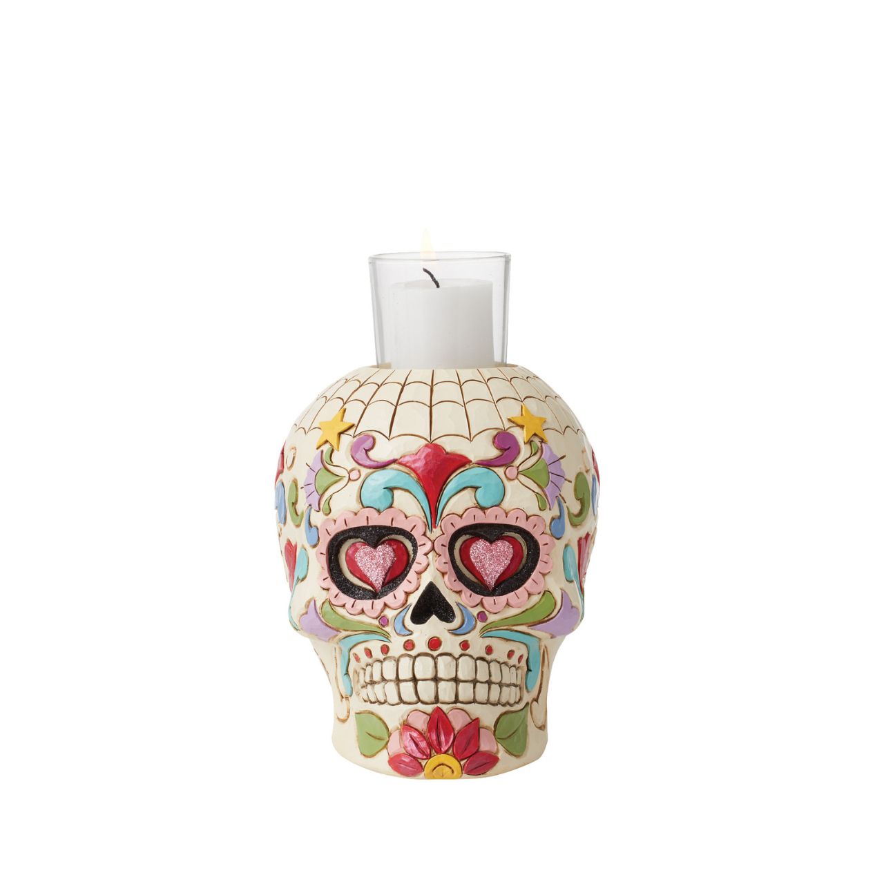 Designed in the iconic style of Jim Shore. This Day of the Dead purple skull candleholder is beautifully decorated with lively Mexican inspired pattern and colour. Modelled after a sugar skull. Hand painted in high quality cast stone. Designed by award-winning artist and sculptor Jim Shore for Heartwood Creek.