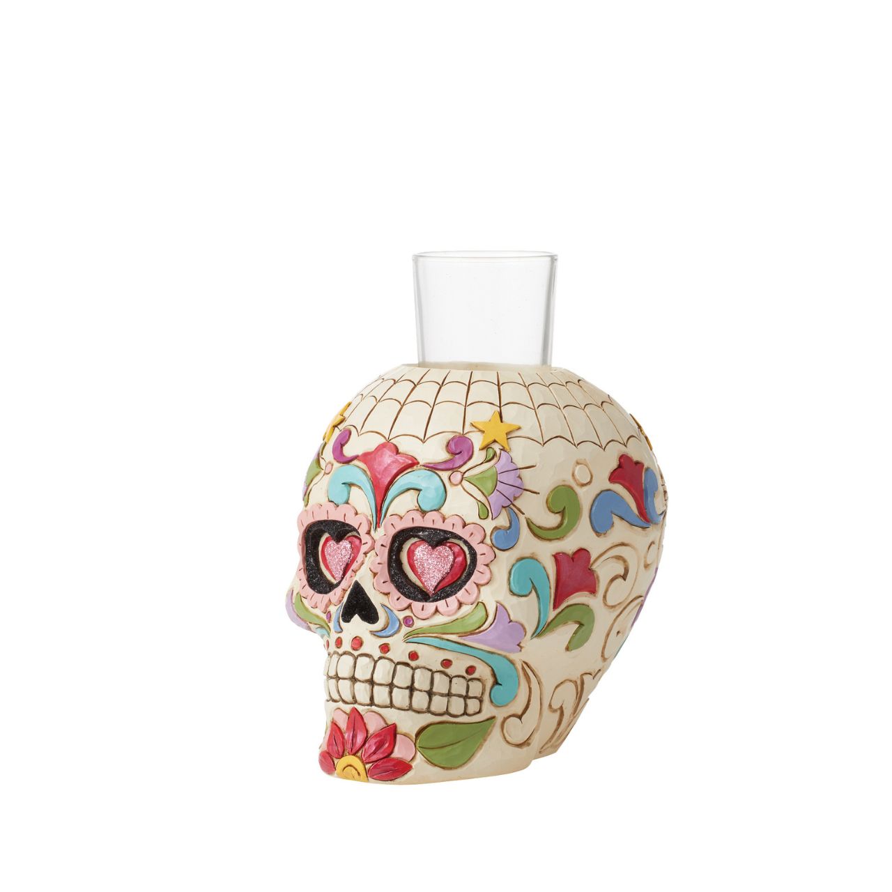 Designed in the iconic style of Jim Shore. This Day of the Dead purple skull candleholder is beautifully decorated with lively Mexican inspired pattern and colour. Modelled after a sugar skull. Hand painted in high quality cast stone. Designed by award-winning artist and sculptor Jim Shore for Heartwood Creek.