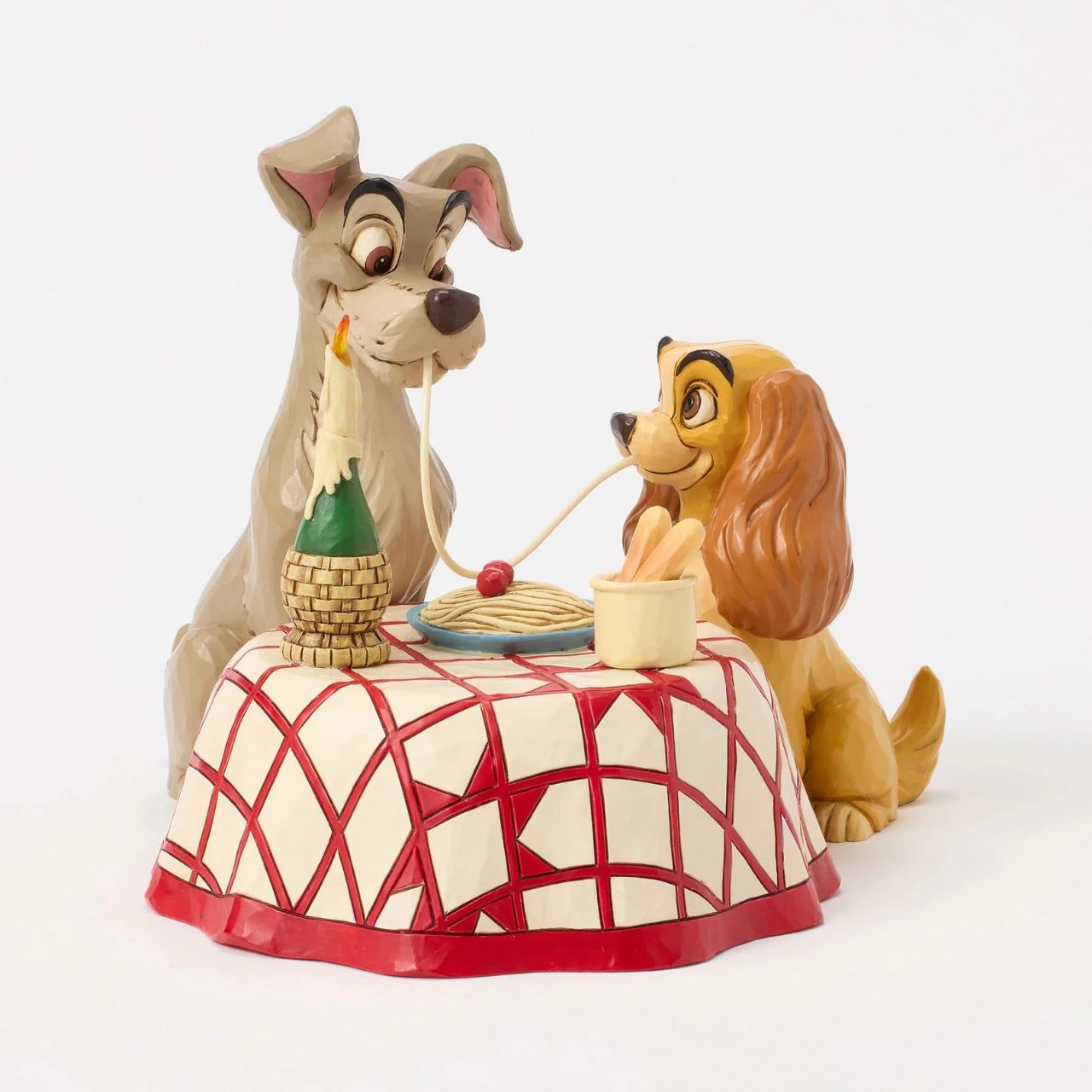 This delightful Jim Shore design celebrates the 70th anniversary of Lady and the Tramp, depicting the pair sharing a table and a plate of pasta, they playfully chew the same noodle. Relive the romance and nostalgia of this timeless love story. Uses 3x AAA batteries (not included) and has an automatic timer, 6 hours on, 18 hours off.