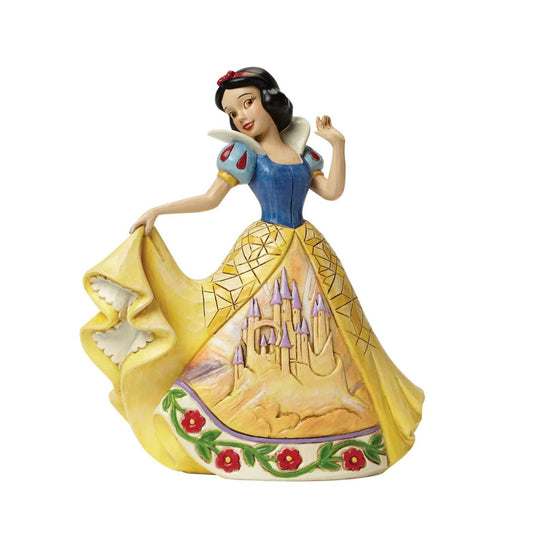 Castles In the Clouds Snow White Figurine  Snow White's Prince did come and escorted her to a majestic castle in the sky. Designed by award winning artist and sculptor, Jim Shore for the Disney Traditions brand. The figurine is made from cast stone.