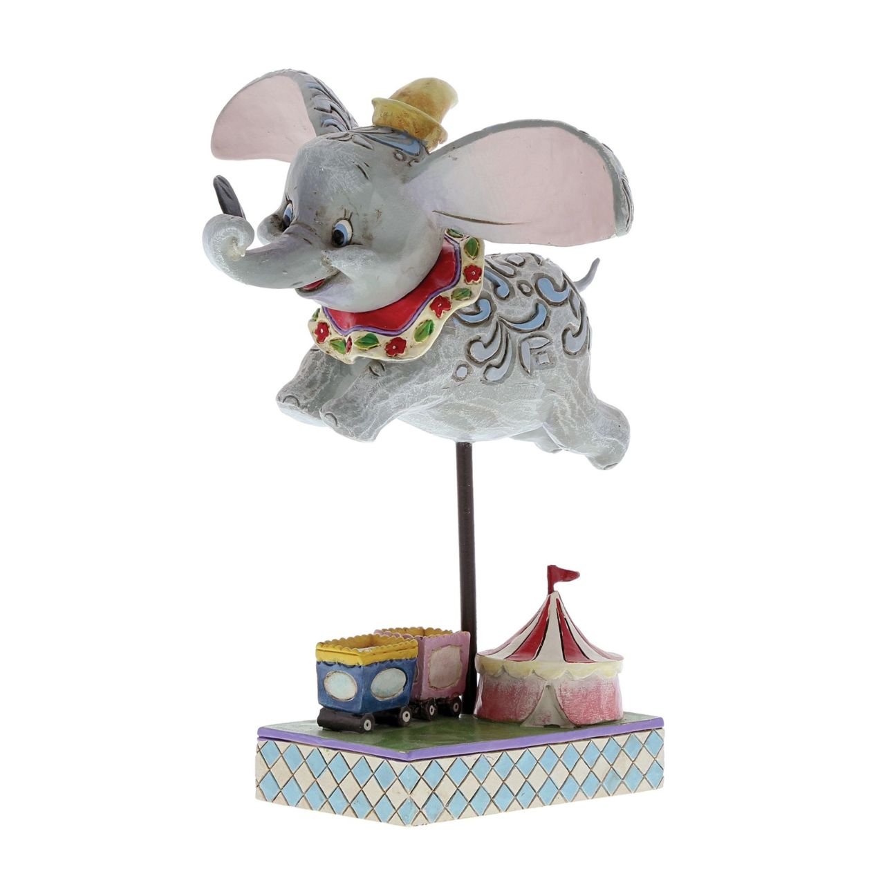 Jim Shore Dumbo Faith in Flight Figurine  Faith in Flight (Dumbo Figurine)  Disney Traditions combines the magic of Disney with the American folk artistry of Jim Shore. Enjoy this wonderful figurine of beloved Dumbo as he takes his first flight with the help of a magical feather.