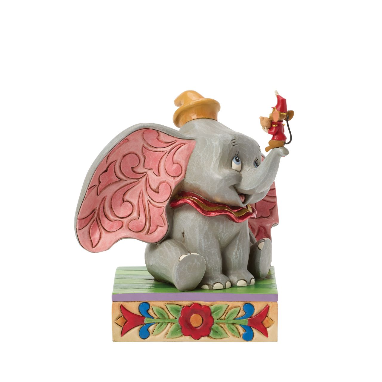 Dumbo the big eared elephant and Timothy the mouse share a joyful moment in this heartfelt Jim Shore scene.
