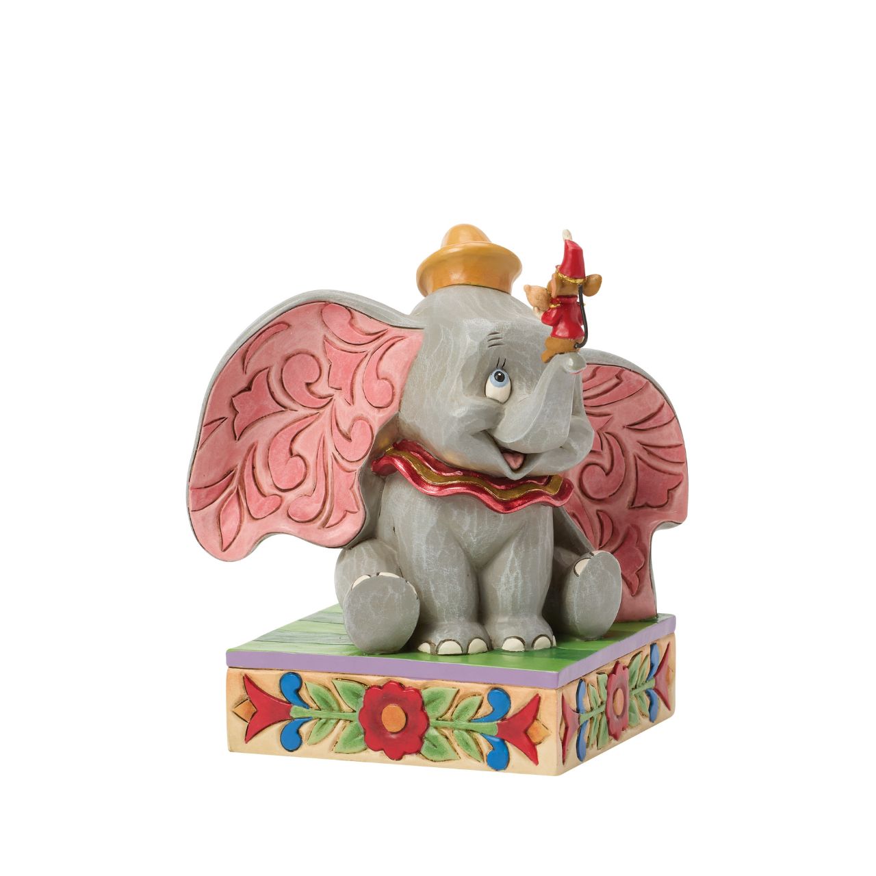 Dumbo the big eared elephant and Timothy the mouse share a joyful moment in this heartfelt Jim Shore scene.