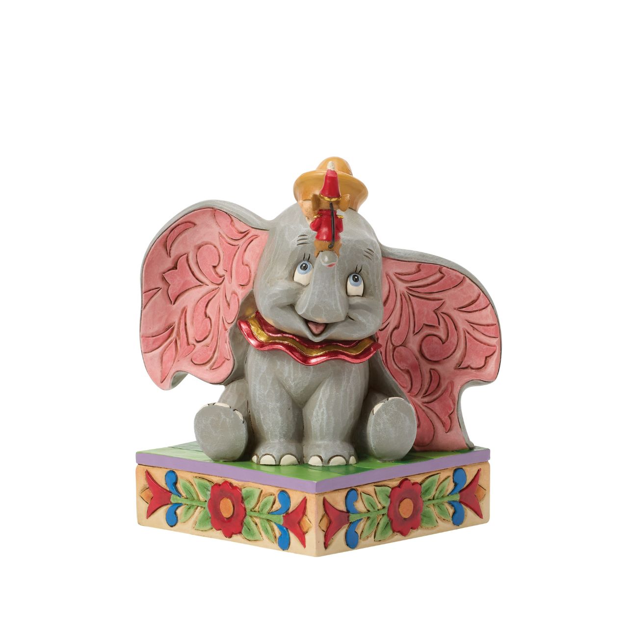 Dumbo the big eared elephant and Timothy the mouse share a joyful moment in this heartfelt Jim Shore scene.