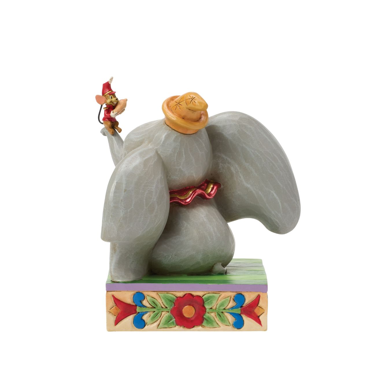 Dumbo the big eared elephant and Timothy the mouse share a joyful moment in this heartfelt Jim Shore scene.