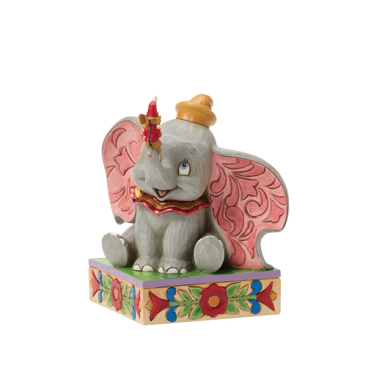 Dumbo the big eared elephant and Timothy the mouse share a joyful moment in this heartfelt Jim Shore scene.