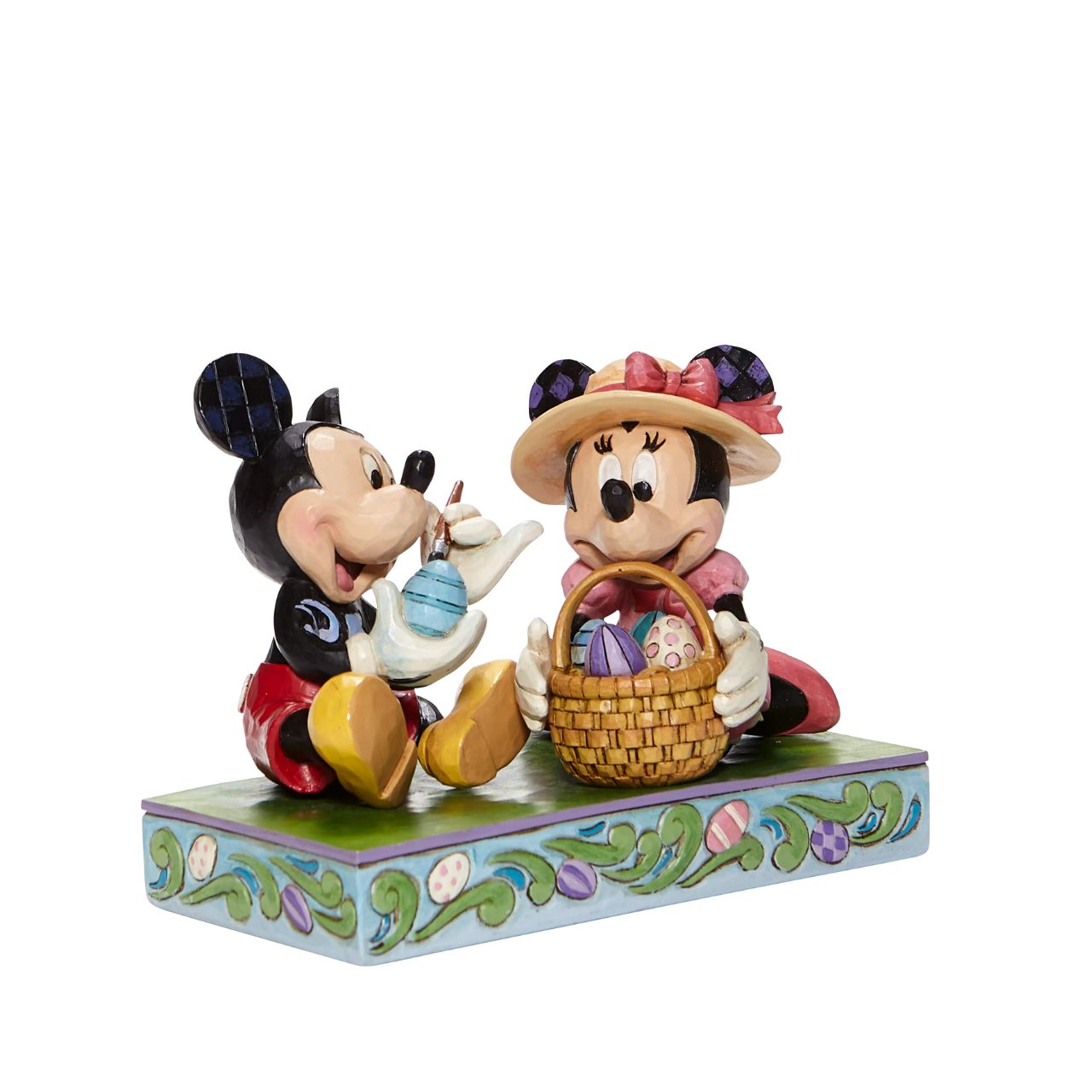In this joyful scene, Mickey and his sweetheart Minnie, are filled with excitement as they perfect their eggs for an egg hunt. Brighten up your collection with this vibrantly, colourful Easter piece by Jim Shore. Made from cast stone. Unique variations should be expected as this product is hand painted