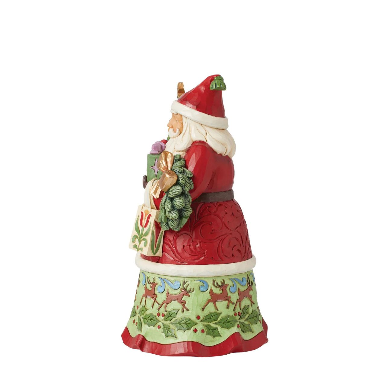 First Edition Signed Figurine - Limited Quantity. Santa is ready to deliver this Christmas. Hand painted, this figurine features Santa with arms full of gifts and is the perfect addition to any festive display.