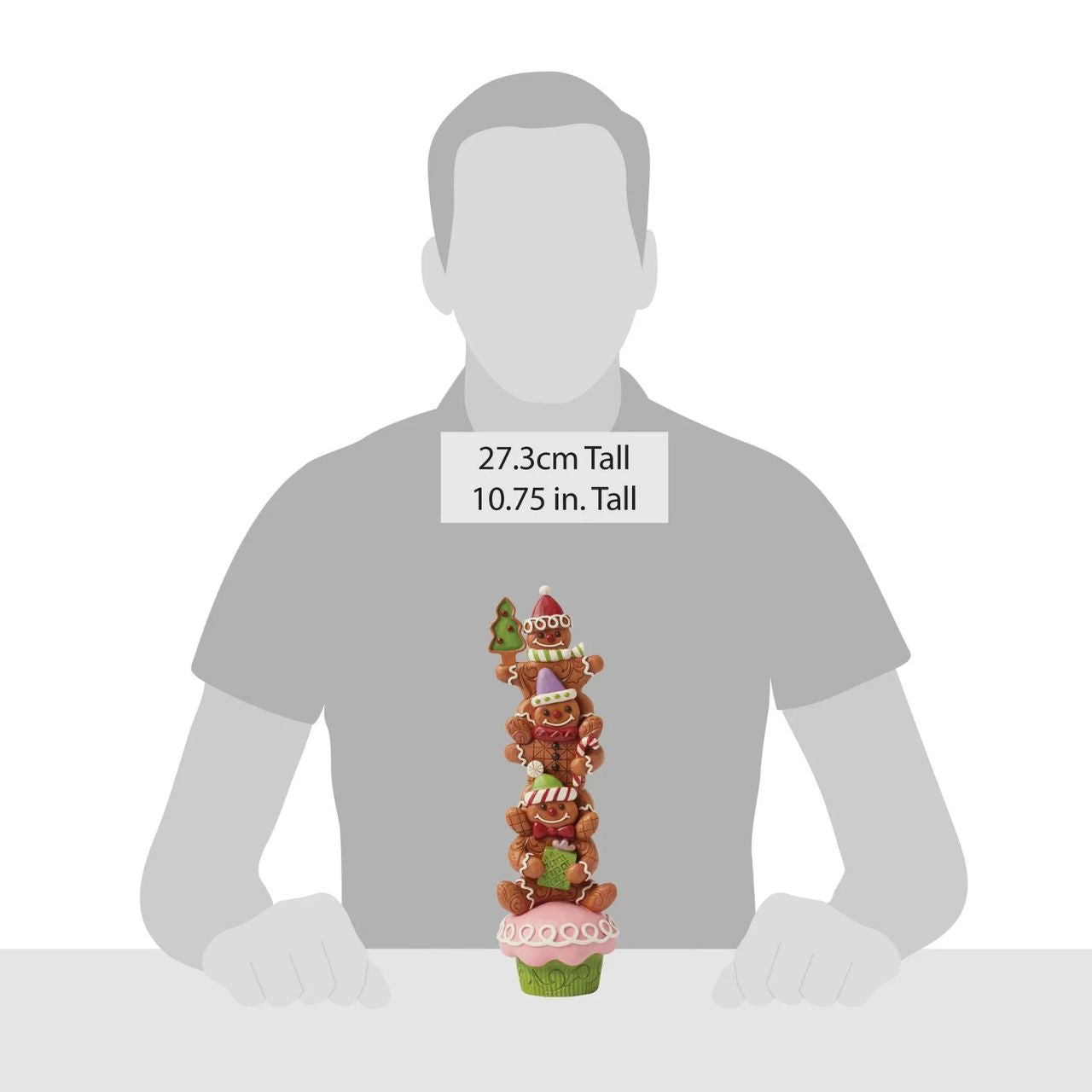 This delightful Gingerbread Christmas Jim Shore design features a festive cupcake topped with three cheerful gingerbread men, each adorned with colorful icing, candy, sprinkles, with signature Jim Shore patterning. They sure capture the joy and warmth of Christmas season.