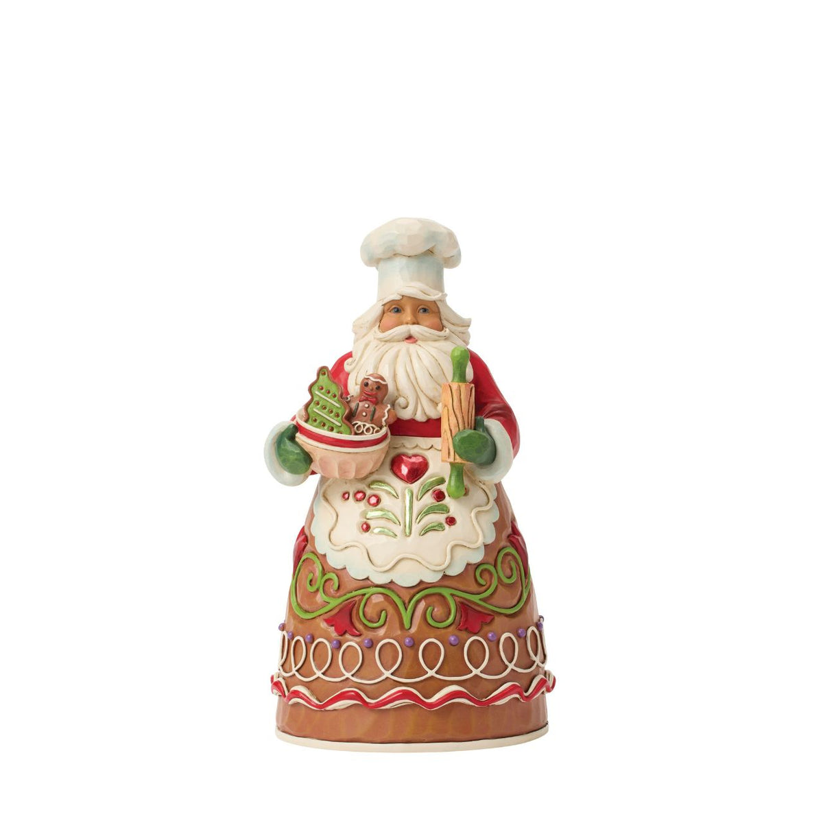 Dressed in a chef's hat and apron, this gingerbread Santa is ready to bake up Christmas joy. Jim Shore's playful patterns and candy-like details give the design a delightful, sugar-coated charm. A treat for both collectors and holiday kitchens alike.