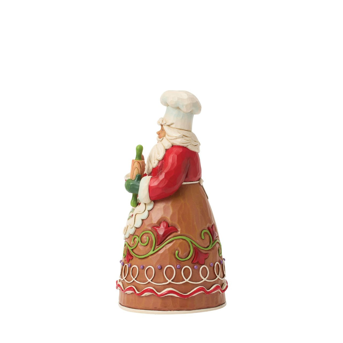 Dressed in a chef's hat and apron, this gingerbread Santa is ready to bake up Christmas joy. Jim Shore's playful patterns and candy-like details give the design a delightful, sugar-coated charm. A treat for both collectors and holiday kitchens alike.