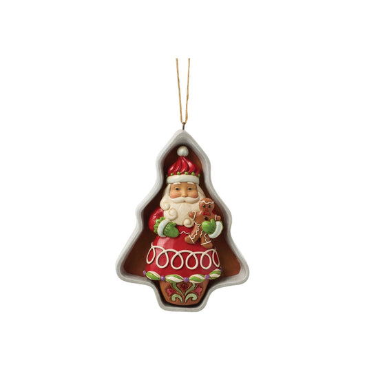 Enhance your Christmas collection with this Heartwood Creek Santa Cookie Cutter figurine by Jim Shore.