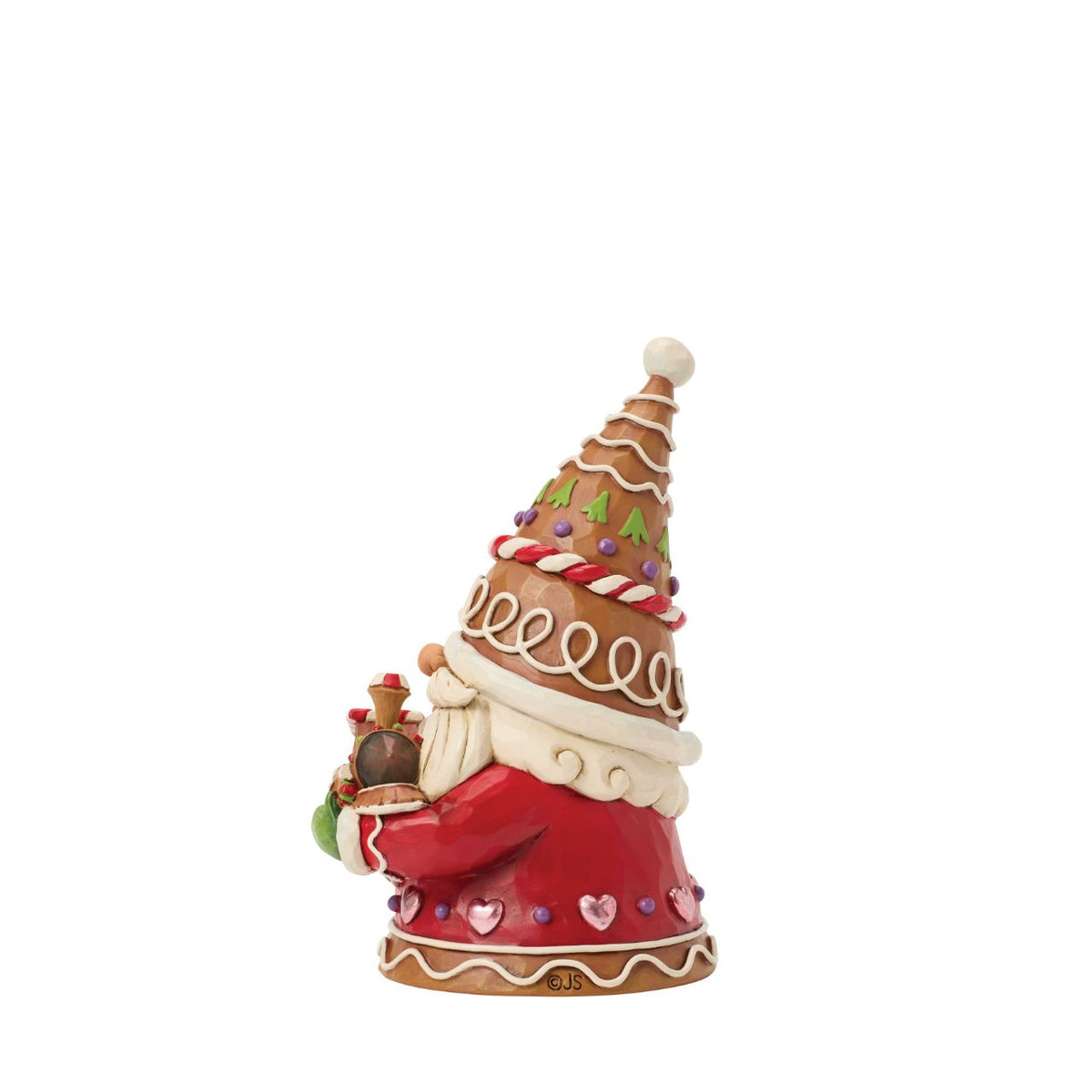 Full of charm, this gingerbread gnome stands proudly with a candy-powered train. Jim Shore's detailing adds warmth and character, turning a playful scene into a treasured holiday memory. Perfect for lovers of gnomes and gingerbread alike.