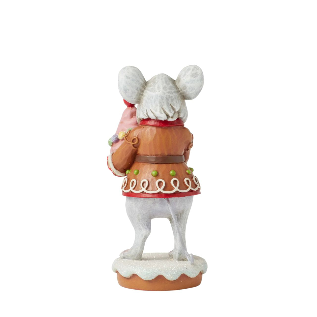 This charming Gingerbread Christmas mouse by Jim Shore offers you a delightful cupcake topped with a bright red cherry. Dressed in a festive gingerbread coat adorned with icing details, his sweet smile and cheerful spirit, brings a touch of whimsy to you.