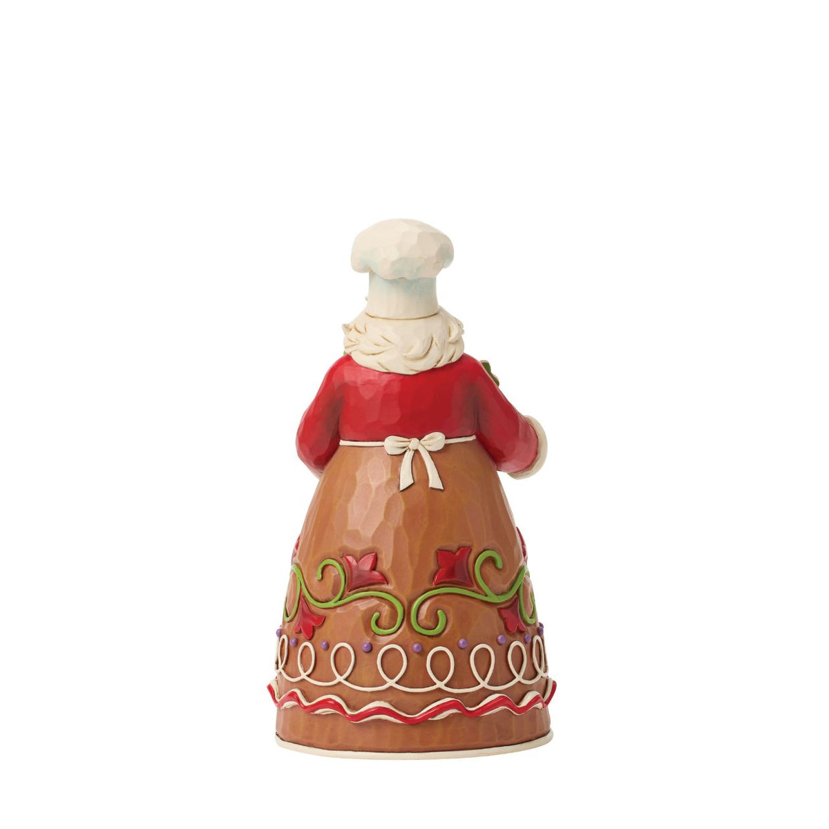 Dressed in a chef's hat and apron, this gingerbread Santa is ready to bake up Christmas joy. Jim Shore's playful patterns and candy-like details give the design a delightful, sugar-coated charm. A treat for both collectors and holiday kitchens alike.