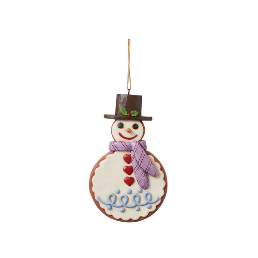 This Christmas ornament is modelled to look like a gingerbread cookie! This eye-catching snowman is patterned with rosemaling icing, candy pieces, and sprinkles. Will make a sugary sweet addition to your family's holiday tree collection.