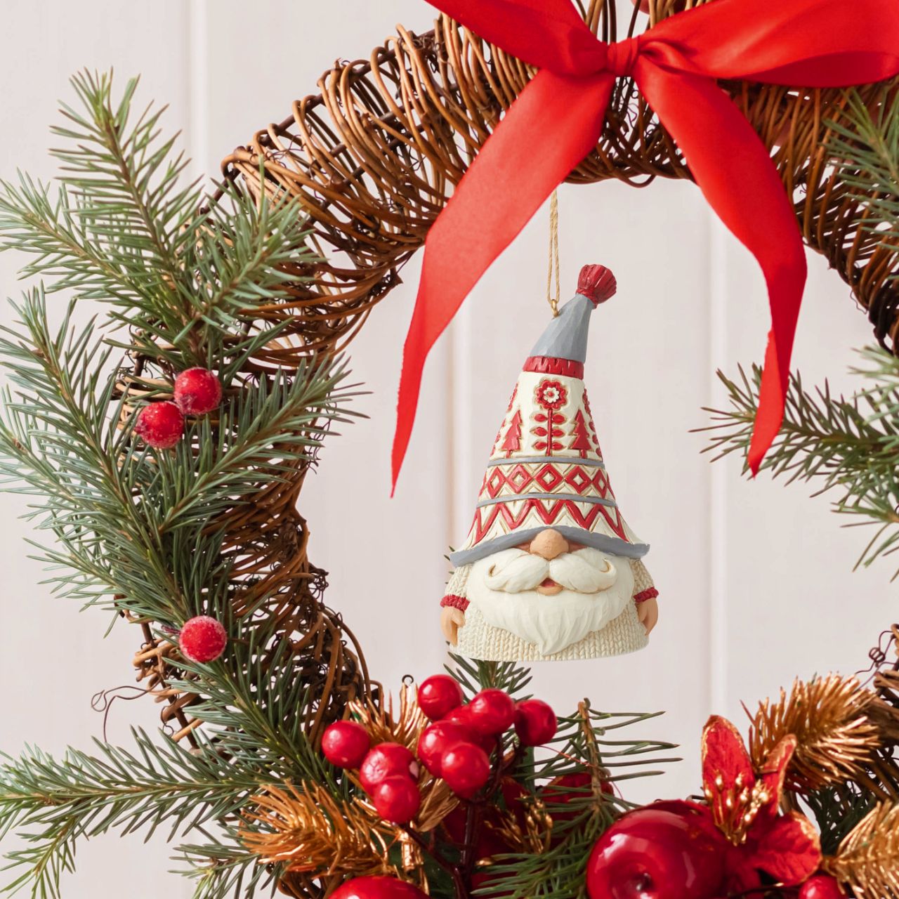 Part of the Nordic Noel Collection; this gnome features a knitted white jumper with a Christmas design on his hat. This super cute Gnome Hanging Ornament is the perfect addition to any Christmas Tree.