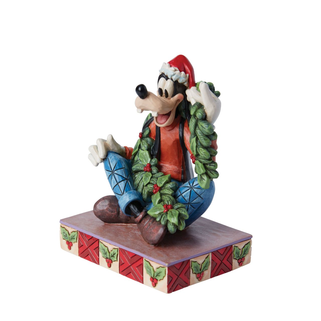 Goofy is celebrating Christmas in this cute festive figurine. Hand crafted by Disney Traditions, it comes in a fully branded gift box.