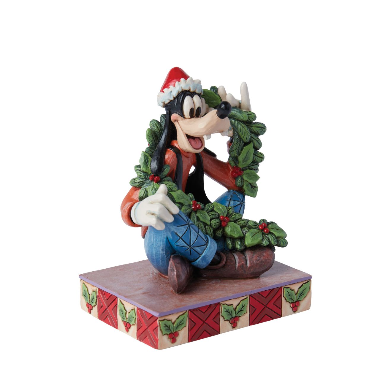 Goofy is celebrating Christmas in this cute festive figurine. Hand crafted by Disney Traditions, it comes in a fully branded gift box.