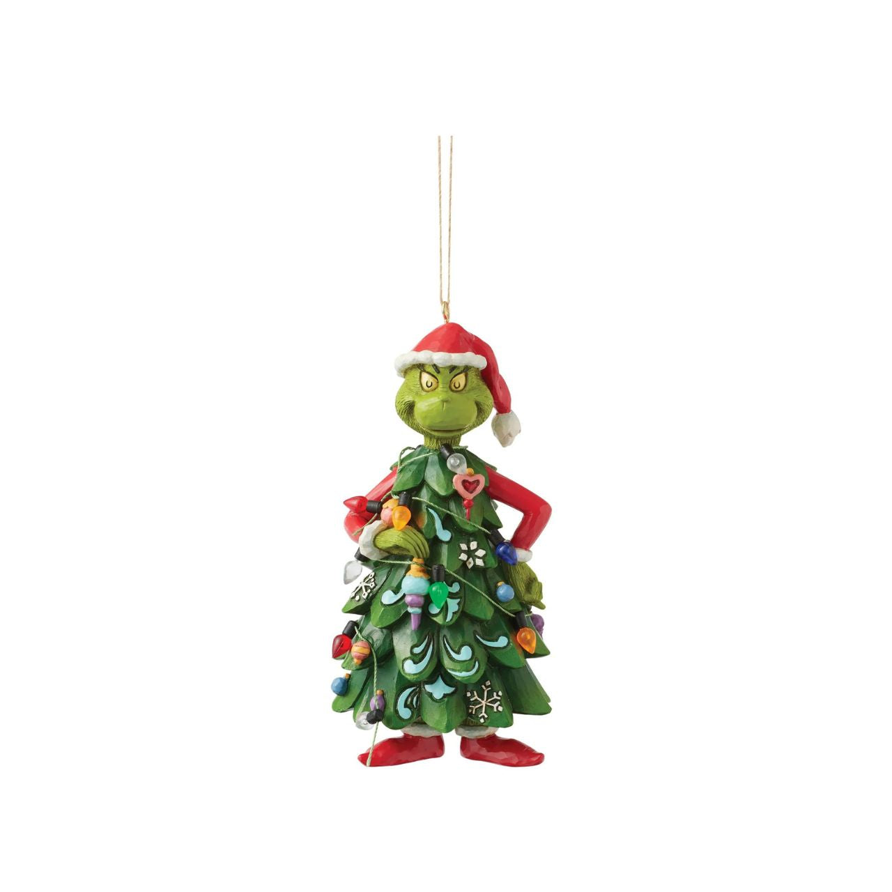 Dressed as a Christmas tree, the Grinch holds an ornament, mischievously decorating himself in this playful Jim Shore design.