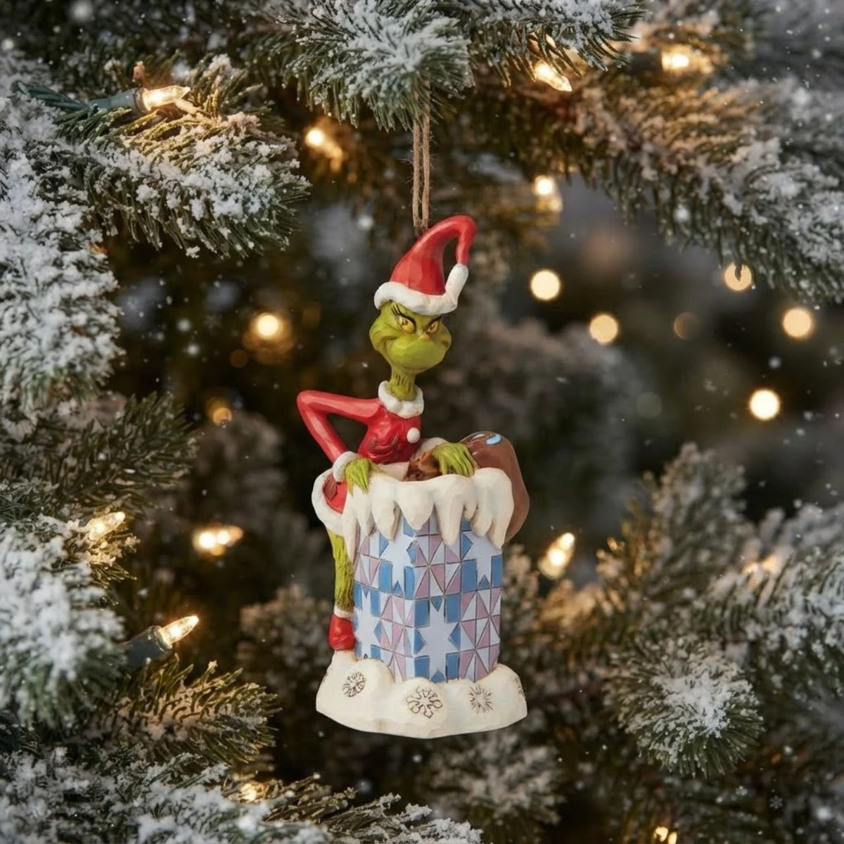 Marrying two beloved holiday figures, Jim Shore creates an ornament that captures the Grinch in all his glory. With holly brimmed in his Santa hat, no one dares kiss this Christmas Nutcracker for fear of being cracked across the face.