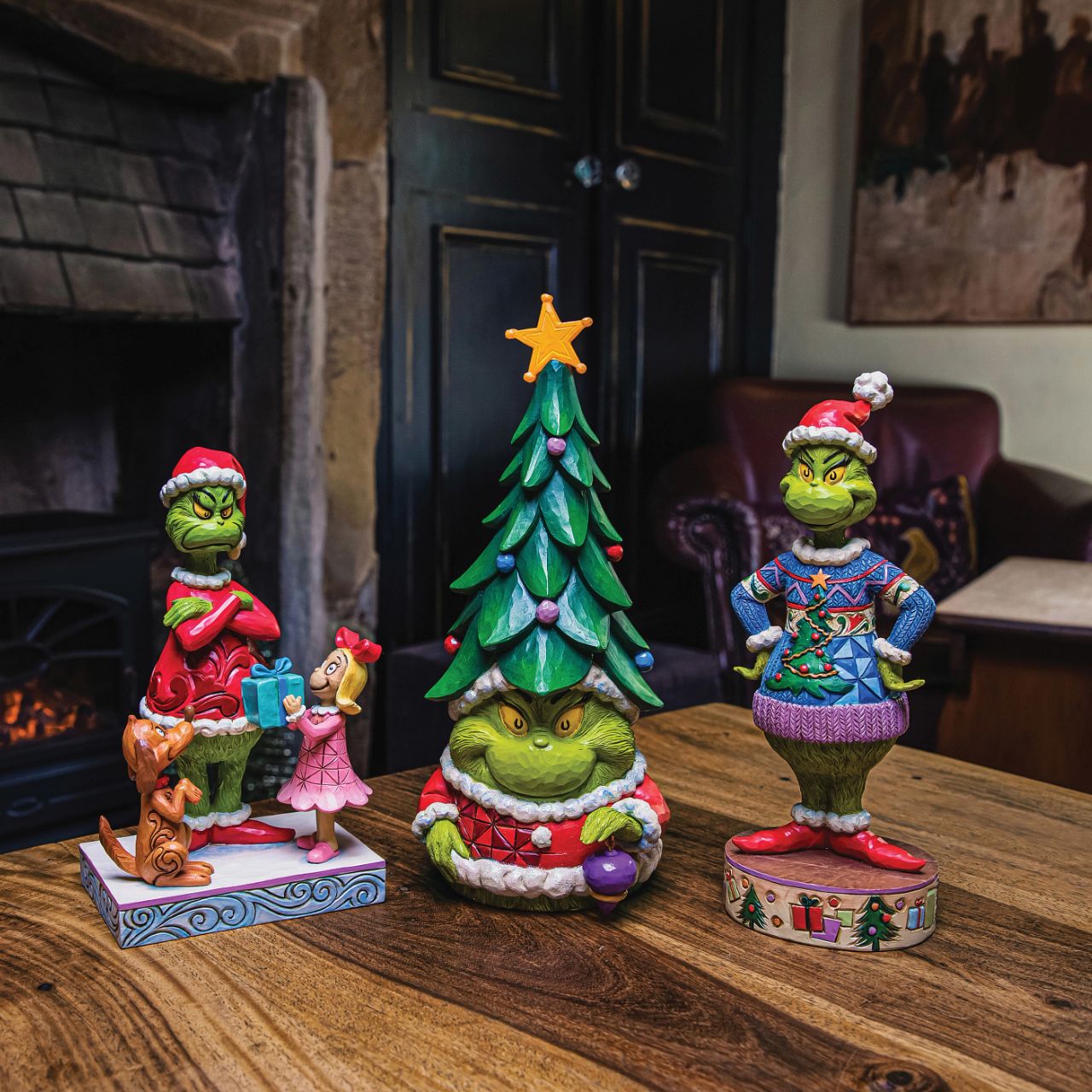 Known for his gnomes, Jim Shore presents his newest garden fairy crafted with Dr. Seuss flair. With a Christmas tree for a hat and a lit star, this grinning green Santa imposter delights with yellow eyes. Bring The Grinch home this holiday.