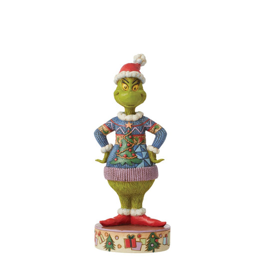 Grinch Wearing Ugly Sweater Figurine  The Grinch shows his love for a Christmas jumper in this figurine. Designed by award winning folk artist Jim Shore his jumper is intricately designed with so much detail it looks almost real.